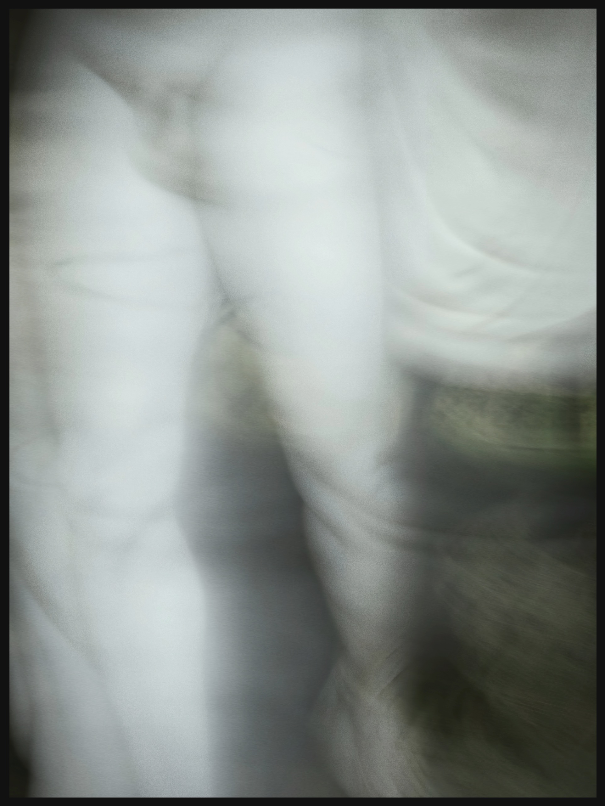 MAN IN OLIVE, NEAR, 2025, Pigment print on paper, translucent acrylic, artist’s frame — OYOUNG